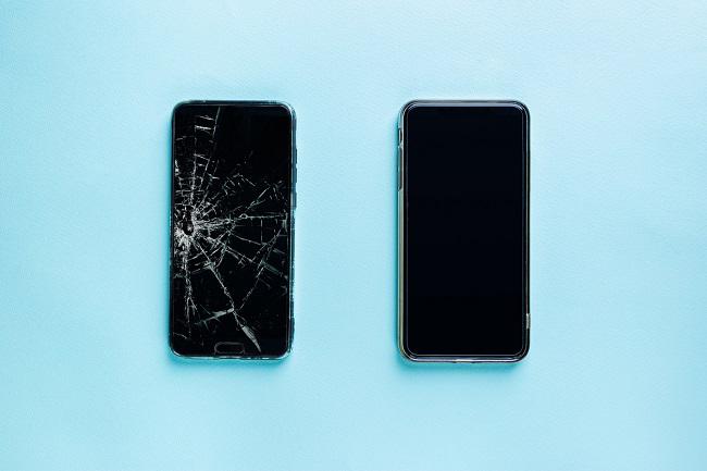 broken phone next to new phone